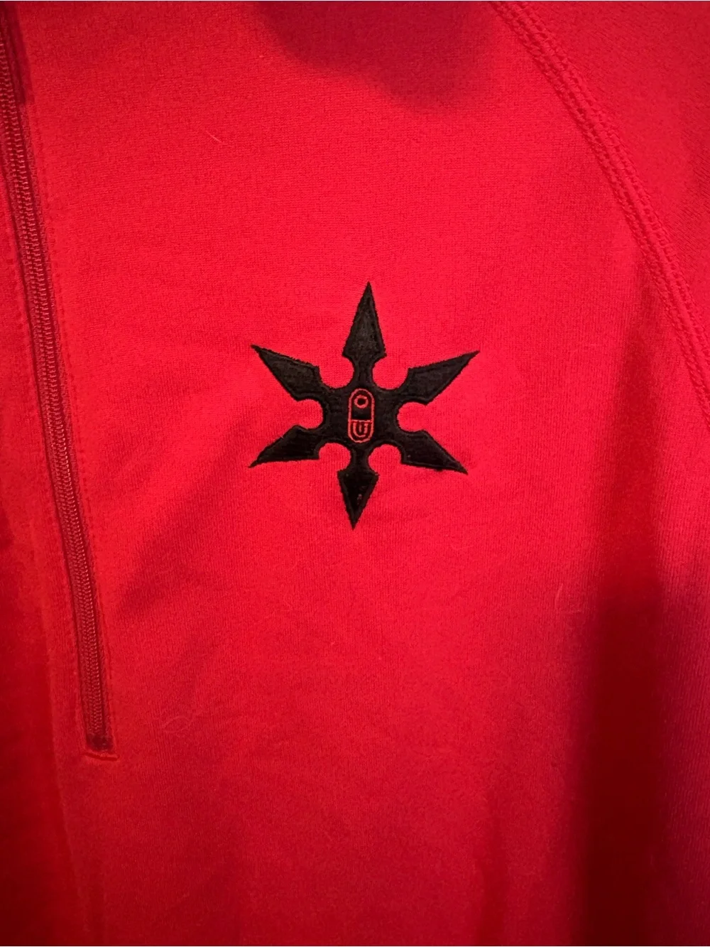 Men's Red Half-Zip Performance Sweater with Subtle Star Emblem